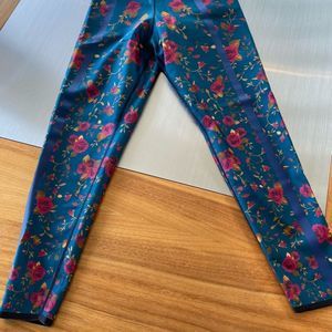 Gently Worn UltraCor floral pattern 3/4 length leggings